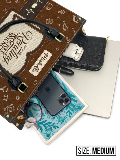 Teaching Reading Is Rocket Science Leather Bag